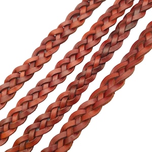 May include: Three strands of brown leather braided together. The leather is a rich brown color and has a slightly textured surface.