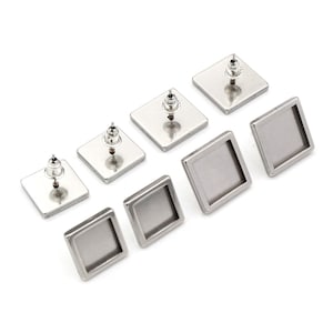 May include: Set of six silver square earring blanks with a bezel for inserting a cabochon or other embellishment. The blanks are arranged in order of size, with the largest blank at the top and the smallest blank at the bottom.