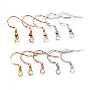 May include: A set of 10 earring hooks in three different finishes: gold, rose gold, and silver. The hooks are made of metal and have a spring-loaded closure.