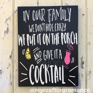 In Our Family We Don't Hide Crazy, We Put It On The Porch And Give It A Cocktail 9 x 12 inch Painted Wood Sign image 1