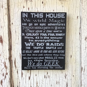 We Do Geek - In This House 9" x 12" Painted Wood Sign - Magic Epic Middle Earth Once Upon A Time Galaxy 42 Raids Truffle Shuffle Muggles
