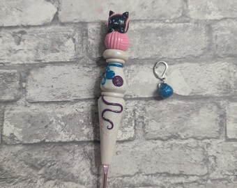 Black Cat with Pink, Purple, and Turquoise Yarn Inspired Ergonomic Crochet Hook