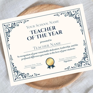 May include: A Teacher of the Year certificate with a cream background and navy blue decorative border. The certificate includes the text "Teacher of the Year" and space for the school name, teacher's name, date, and signature.