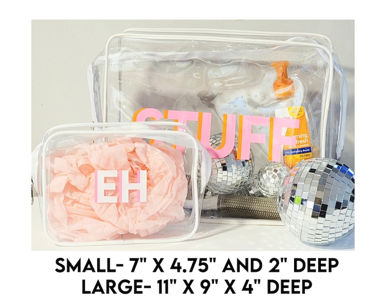 May include: Two clear plastic zippered bags with white trim. The smaller bag is 7 inches by 4.75 inches and 2 inches deep. The larger bag is 11 inches by 9 inches and 4 inches deep. The smaller bag has the letters "EH" in pink and orange on the front. The larger bag has the word "STUFF" in pink and orange on the front.