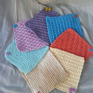 Hand-knitted newborn/baby multicolor set of washcloths.