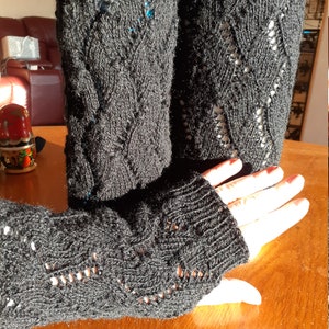 Hand-knitted women matching set of leg warmers and fingerless gloves.Fashion Accessory