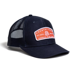 Hat &quot;Country Badge&quot;