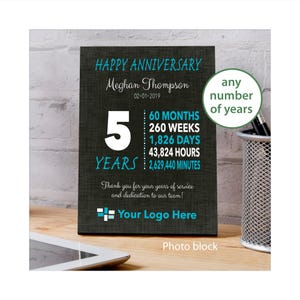 May include: A black photo block with teal text that reads "HAPPY ANNIVERSARY" and "5 YEARS". The block includes the name "Meghan Thompson" and a list of time increments. The bottom of the block says "Your Logo Here".