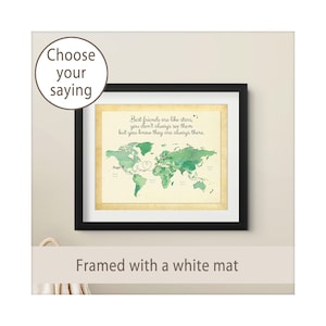 May include: A framed wall art piece featuring a world map in shades of green on a cream background. The text reads: Best friends are like stars, you don't always see them but you know they are always there. A dashed line connects two points.