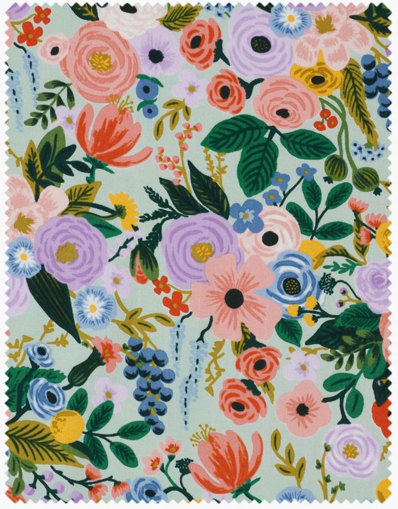 May include: Fabric sample with a floral design. The pattern features a variety of flowers in pink, purple, orange, and blue, set against a pale green backdrop. The design includes roses, tulips, and other blooms, with green leaves and stems.