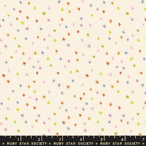 May include: A white fabric with a repeating pattern of colorful stars. The stars are in various shades of blue, orange, yellow, pink, and green. The fabric is perfect for quilting, sewing, and crafting.