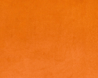 Puede incluir: Un fondo naranja sólido con una superficie ligeramente texturizada.