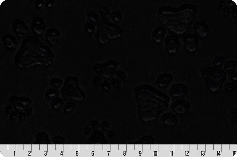 miniature paw prints on black designer fabric from the USA pure