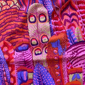 May include: A colorful fabric with a repeating pattern of stylized feathers in shades of pink, purple, orange, and red.