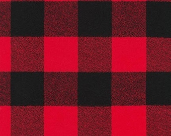 May include: Red and black plaid fabric with a woven texture.