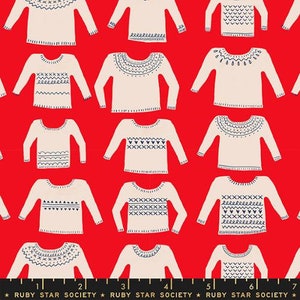 May include: Red fabric with a repeating pattern of white sweaters with different blue knit designs. The fabric has a black ruler with numbers 1 through 7 printed on it. The text "RUBY STAR SOCIETY" is printed on the ruler.