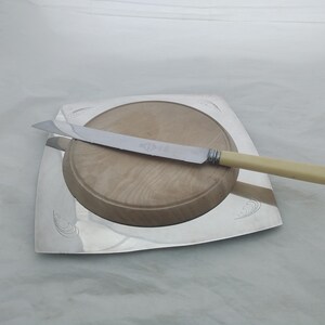 Vintage silver plated bread board with wooden insert and serrated cutter