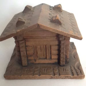 Vintage black forest wooden novelty cabin / house ink well