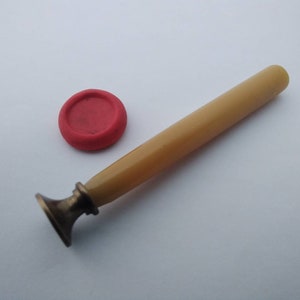 Antique writing seal with plain stamp and bakelite handle