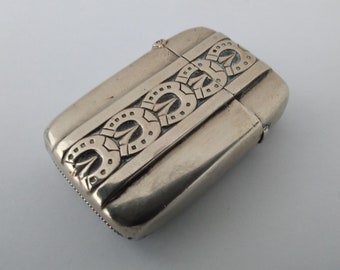 Antique nickel Vesta Case with embossed horseshoe design