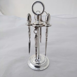 Vintage Four piece silver manicure vanity set on dressing table stand - Birmingham 1909