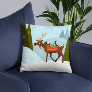 Christmas deer and elf 18"x18" throw pillow girl riding a deer's back in the snowy mountains and pine trees winter snowflakes