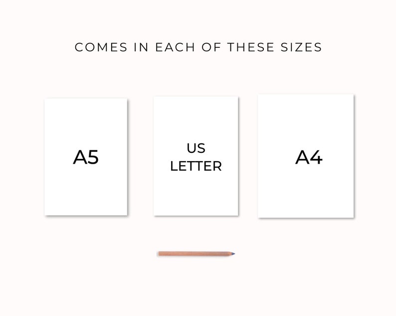May include: Three white paper sheets with the text "A5", "US Letter", and "A4" printed on them. The sheets are arranged in a row from left to right. A pencil is lying below the sheets.