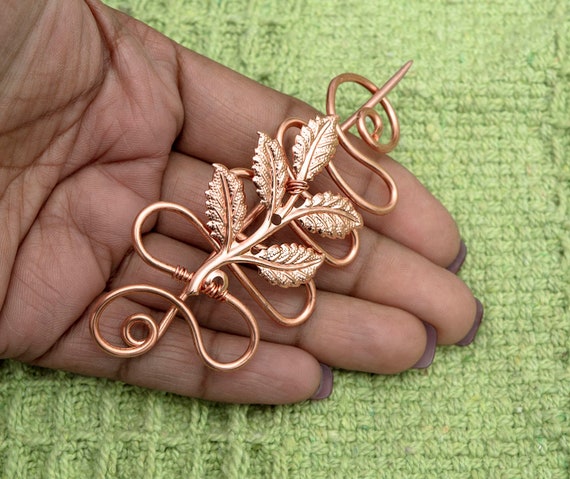 Sweater brooch sale