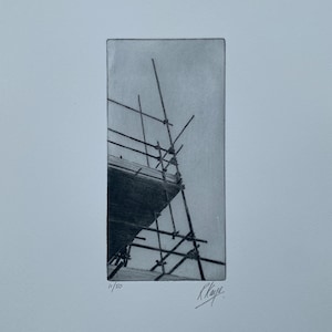 This is a scaffolding print featuring a bold silhouette of some scaffolding on a building. It's very unusual and striking, due to the composition and unexpected subject matrter.
