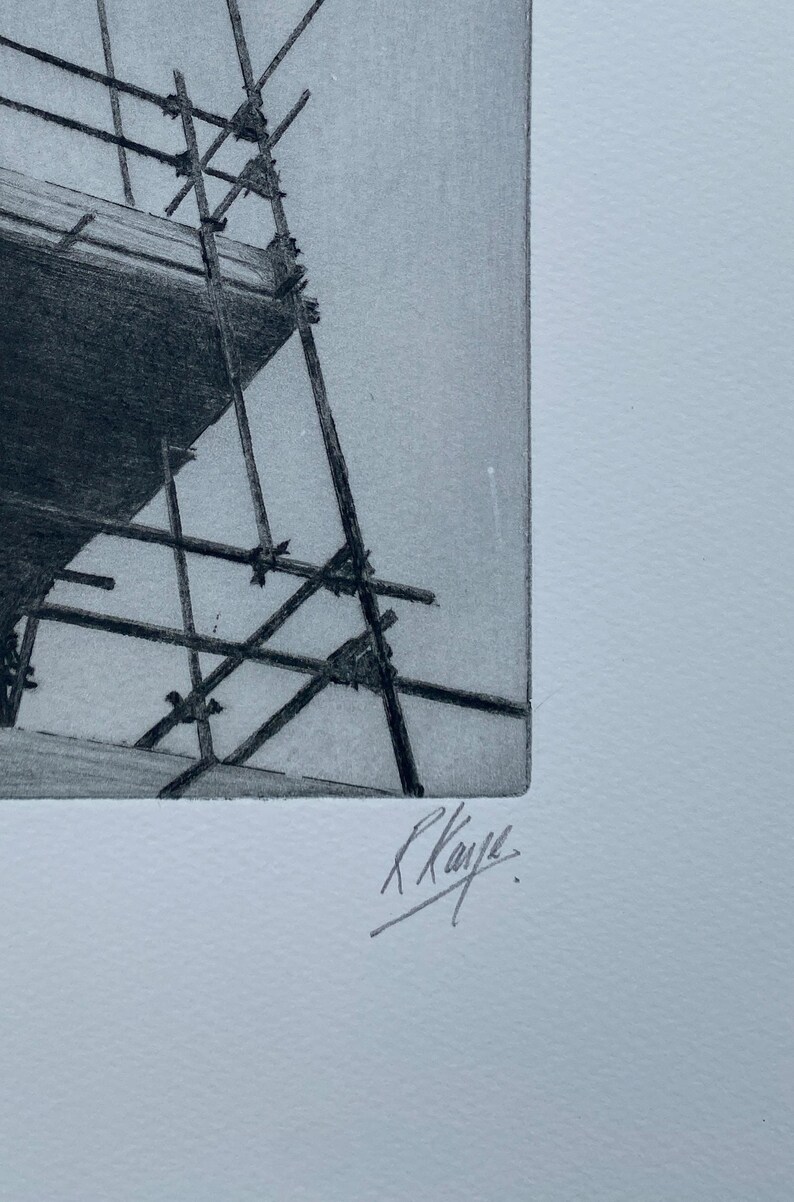 May include: A black and white pencil drawing of a scaffolding structure. The drawing is signed "R. Kaye."