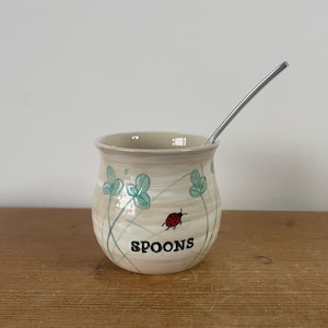 Pottery ladybird teaspoon holder