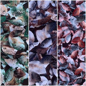 May include: A fabric with a repeating pattern of brown, green, and blue leaves. The leaves are overlapping and have a textured, almost watercolor-like appearance.