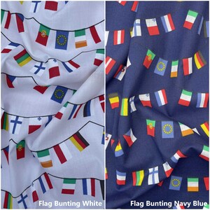 May include: Two fabric swatches of flag bunting, one white and one navy blue. Both feature a repeating pattern of flags from different countries, including the European Union flag.