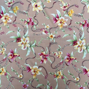 May include: A beige fabric with a repeating pattern of pink, yellow, and green flowers with brown chain links. The flowers are stylized and have a vintage feel.