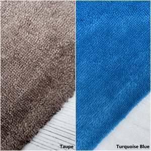 May include: Two fabric swatches, one taupe and one turquoise blue. The fabric is a soft, plush, and textured material.