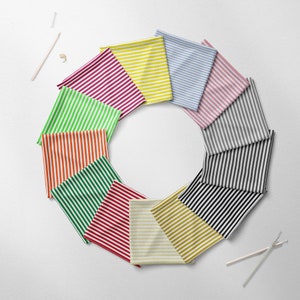 May include: A set of 10 striped fabric swatches in various colours, arranged in a circle on a white background.