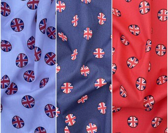 May include: Three fabric swatches with a repeating pattern of the Union Jack flag in circles. The swatches are white, navy blue, and red.