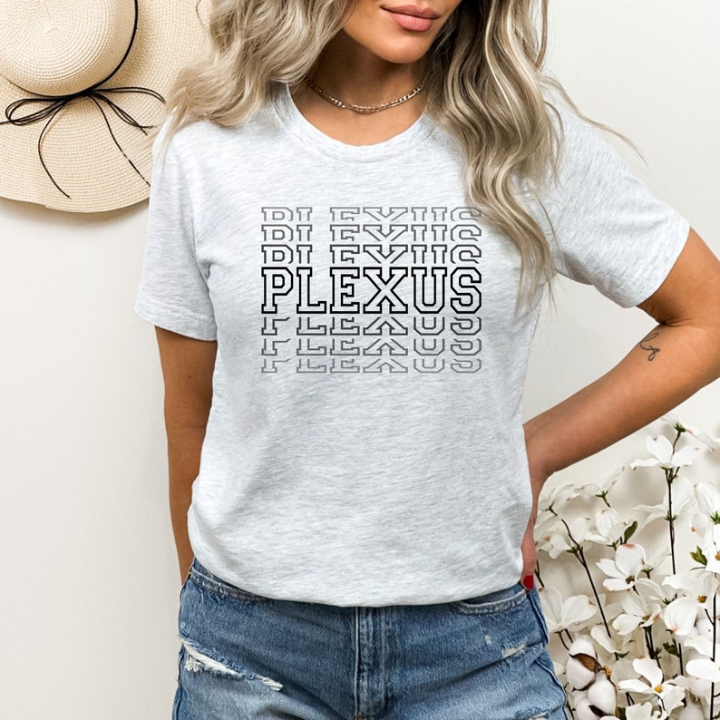 May include: A grey t-shirt with a black graphic that says "PLEXUS" in a stacked, repeating pattern.