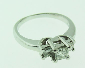 Platinum and 14 K white gold 3 stones engagement ring.