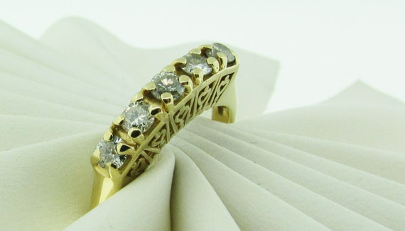 Vintage 14 K gold and diamond wedding band. - image 1