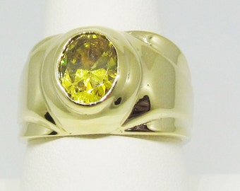 14 Karat yellow gold band with a Citrine stone in the center