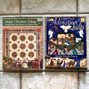 May include: Two instructional books titled Simple Christmas Tidings by Kim Diehl and Adoration Quilts by Rachel W. N. Brown. The first cover features a star-patterned quilt, while the second displays a nativity scene with angels and camels.