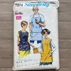 May include: A Simplicity 7974 sewing pattern envelope featuring illustrations of three apron styles. The top center shows a blue and white striped apron. The bottom left shows a blue floral apron. The bottom right shows a yellow polka dot apron.