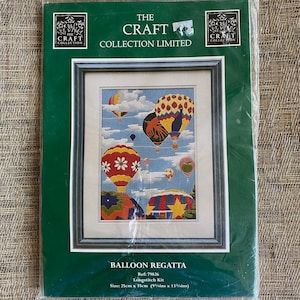 May include: A sealed The Craft Collection Limited longstitch kit titled Balloon Regatta. The packaging features a graphic of colorful hot air balloons in a blue sky. The kit measures 25cm x 35cm, which is approximately 9.84 inches x 13.78 inches.
