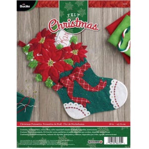 May include: A Bucilla felt Christmas stocking craft kit featuring a dark green stocking decorated with red poinsettia flowers, green leaves, and a red plaid ribbon. The stocking has white cuffs with scalloped edges and sequins. The kit measures 18 inches.