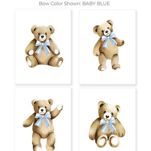 May include: Set of four watercolor prints featuring a brown teddy bear with a blue bow. The prints are perfect for a nursery or child's room.