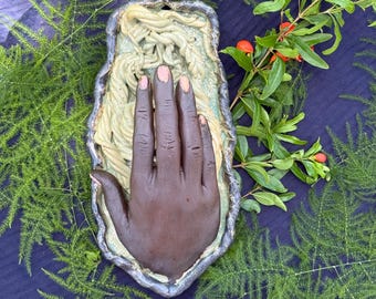 Ceramic Hand Sculpture ready to hang with vines