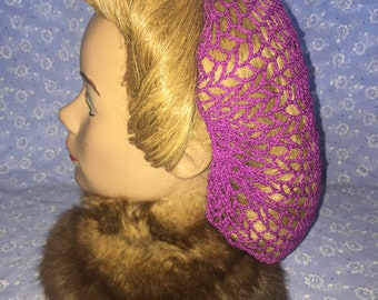Thinner handmade crochet snood/hairnet/filet à cheveux in magenta.