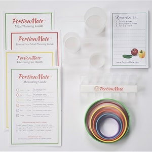 May include: A collection of PortionMate meal planning and measuring tools. Includes guides, measuring cups, and portion control rings in various colors. The guides provide instructions for healthy eating and exercise.