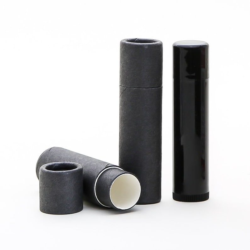 May include: Three black tubes, two are cardboard and one is plastic. The cardboard tubes are open at one end and have a white interior.